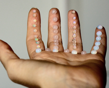 Himmlischer Ring Rosenquarz mit Sonne Mond und Sterne als Astrologie schmuck das perfekte Geschenk für sie